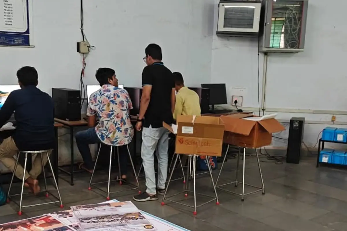 Faculty guiding students during the practical session
