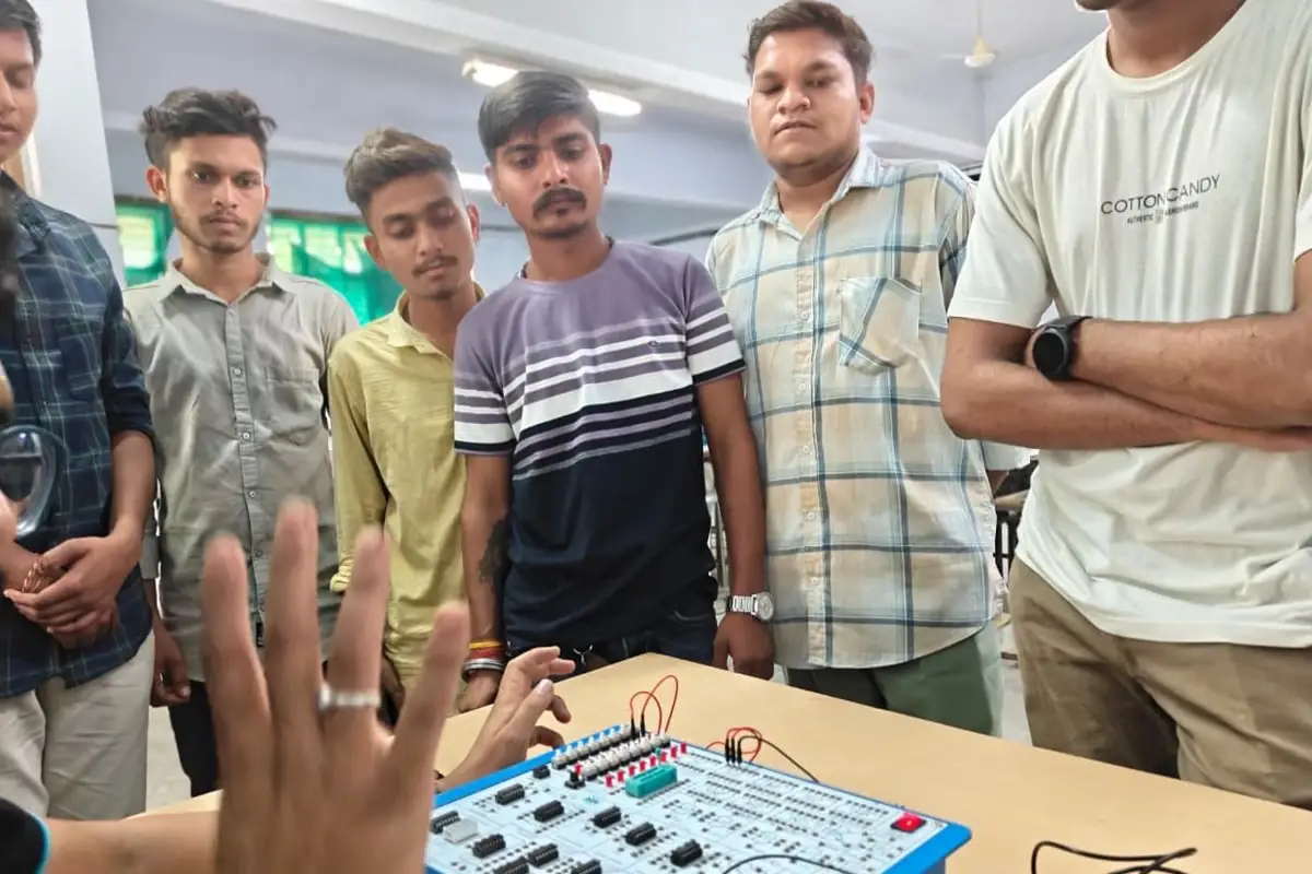 Students verifying logic outputs on the digital IC trainer kit