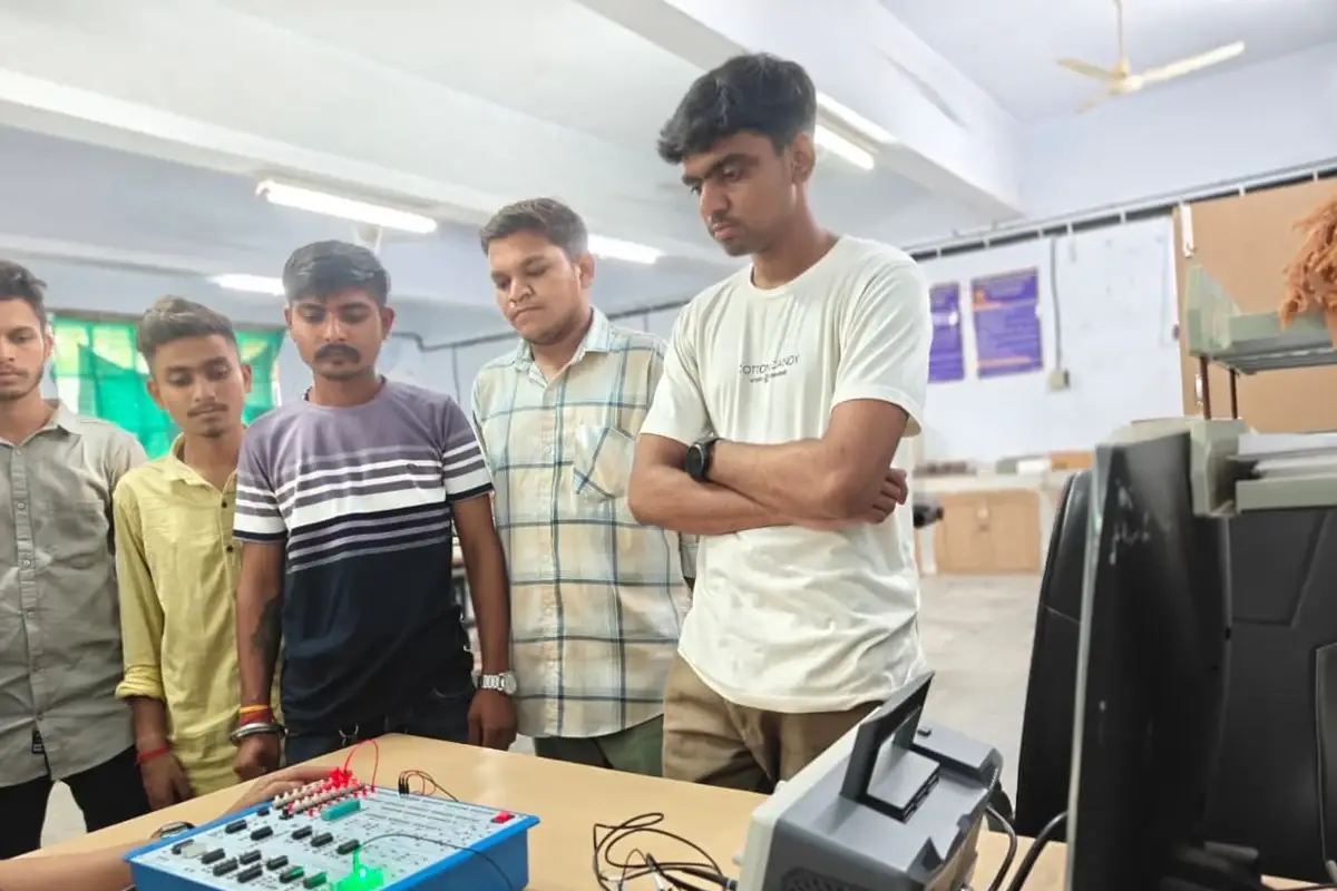 Students observing LED output states during the experiment