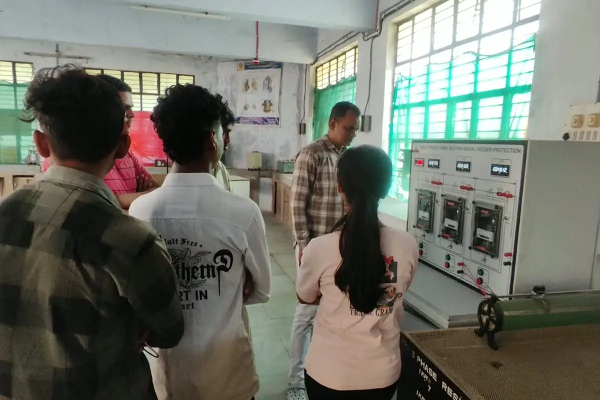 Students observing relay operation during the feeder protection experiment