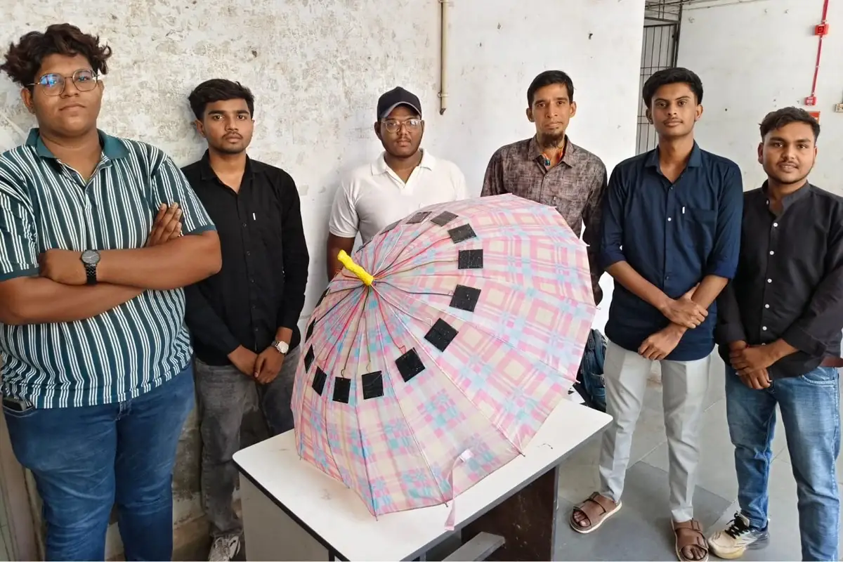 Project team with the solar-powered umbrella prototype