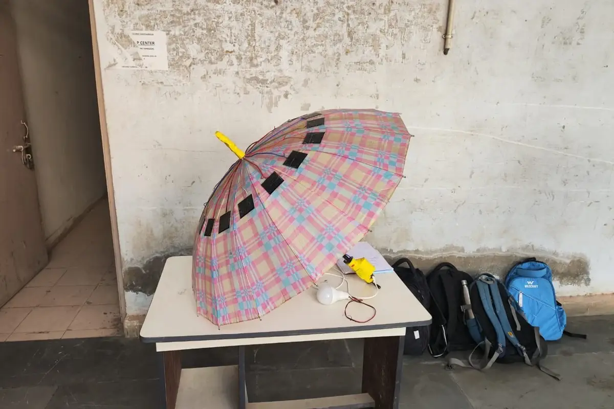 Solar-powered umbrella prototype supplying an LED lamp load